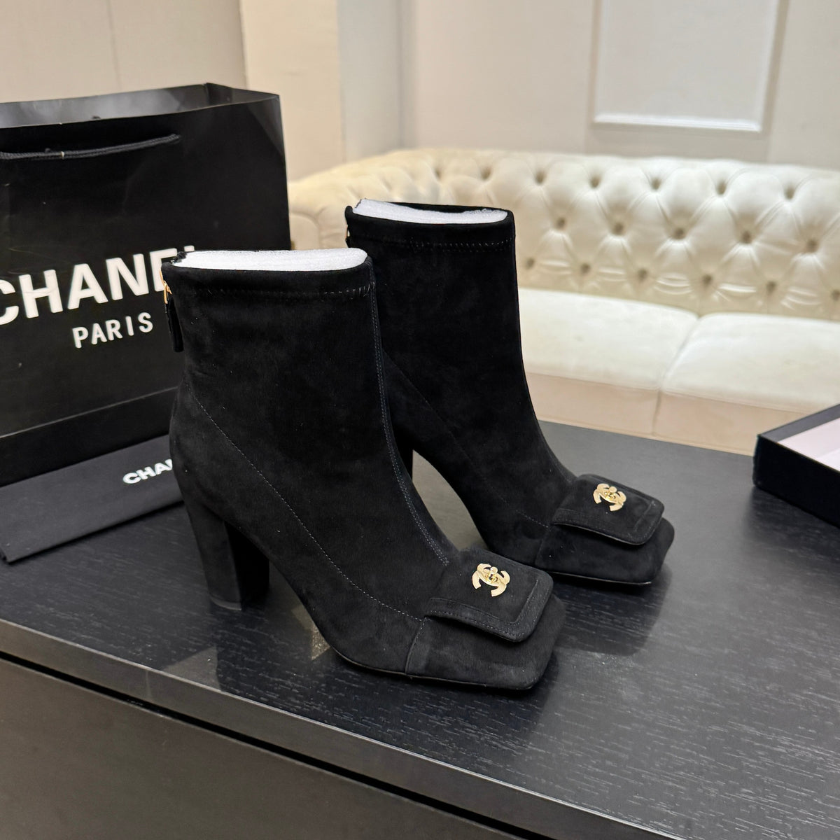 Chanel Black Ankle Boots with Gold-Tone Logo Detail