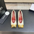 Chanel Ivory Pumps with Gold-Tone Cap-Toes