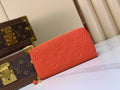 Orange Monogram Embossed Zip-Around Wallet